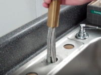 Pull out Faucet Installing process. Step 1. Push the hoses into the sink hole