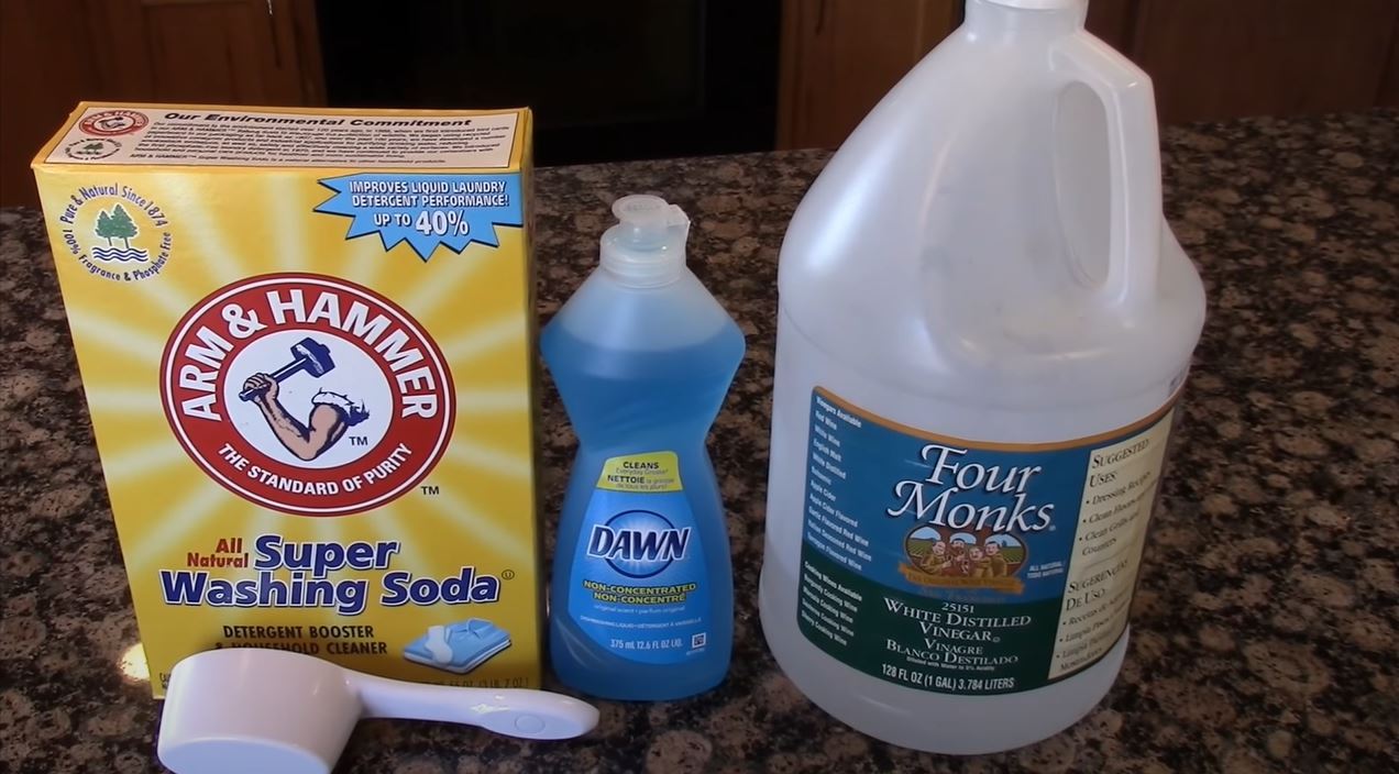 Cleaning tile floors with soda and vinegar