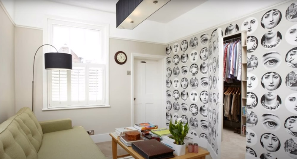 Hang a piece of the black and white photos on the door and the walls