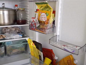 How to adjust refrigerator door swing