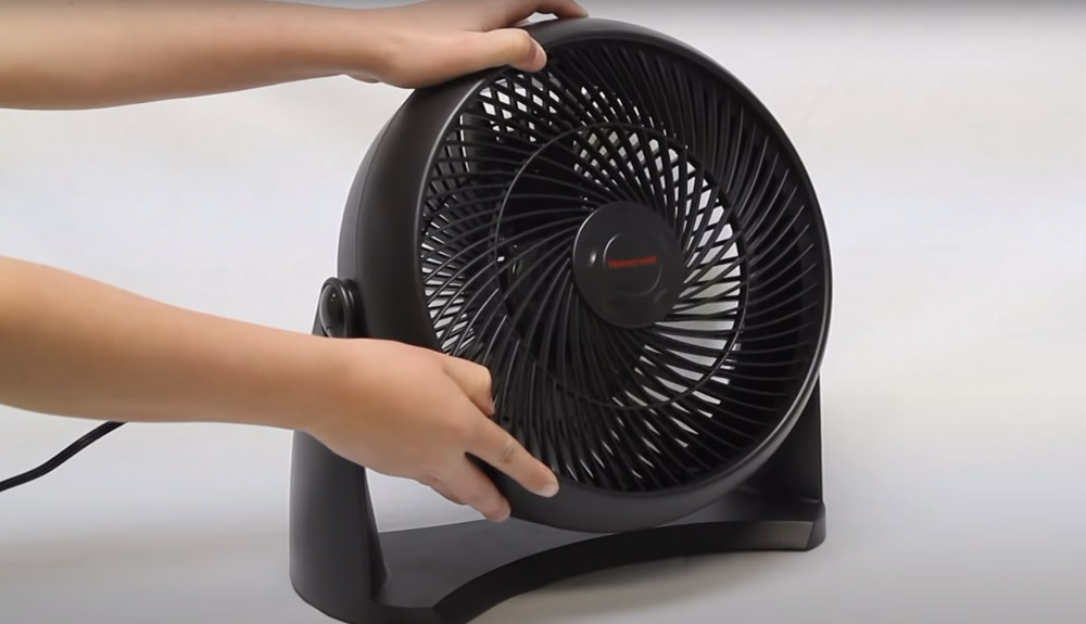 How do you clean a fan without taking it apart