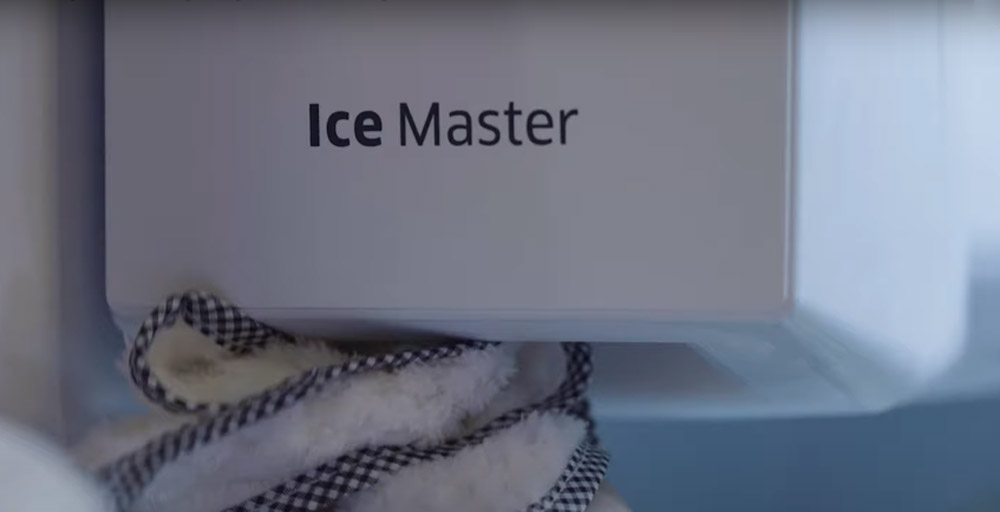 How do I stop my ice maker from dispensing ice